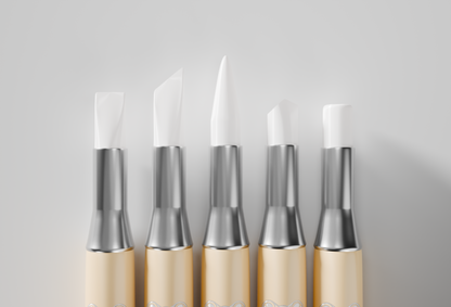 Close-up of five silicone 3D sculpting tool tips in different shapes for nail art